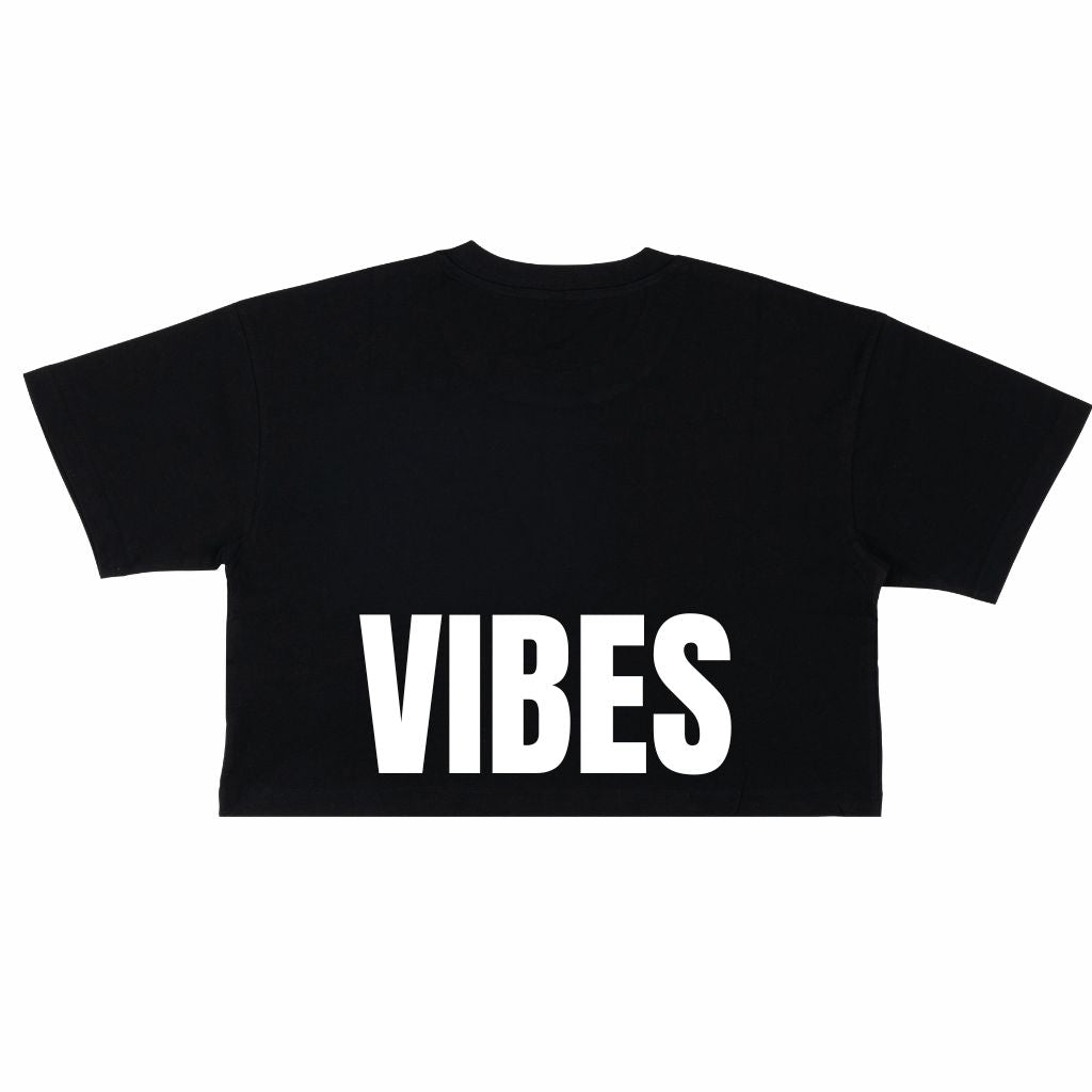 
                  
                    Image features the back of the Be Kind Vibes Be Kind crop top in black with the word Vibes printed in white just above the bottom seam
                  
                