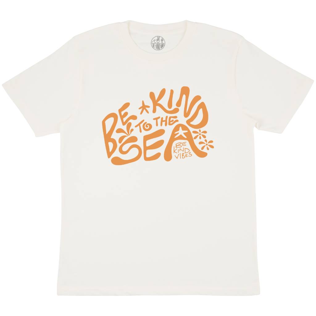 Product image featuring the front of the Be Kind Vibes 100% organic cotton To the Sea t-shirt in natural with a clay colored design that features retro font and ocean symbols.