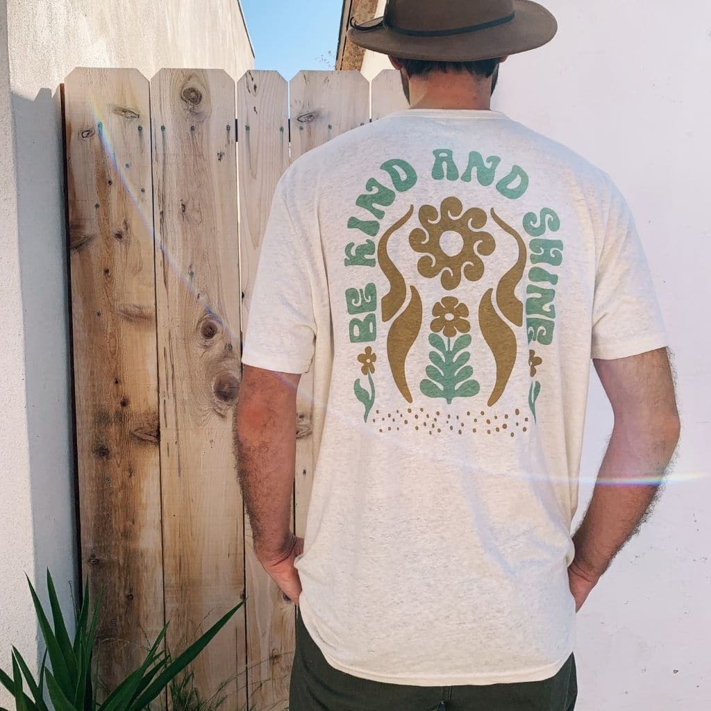Hero image featuring the back of the Be Kind Vibes Be Kind & Shine tee in natural.