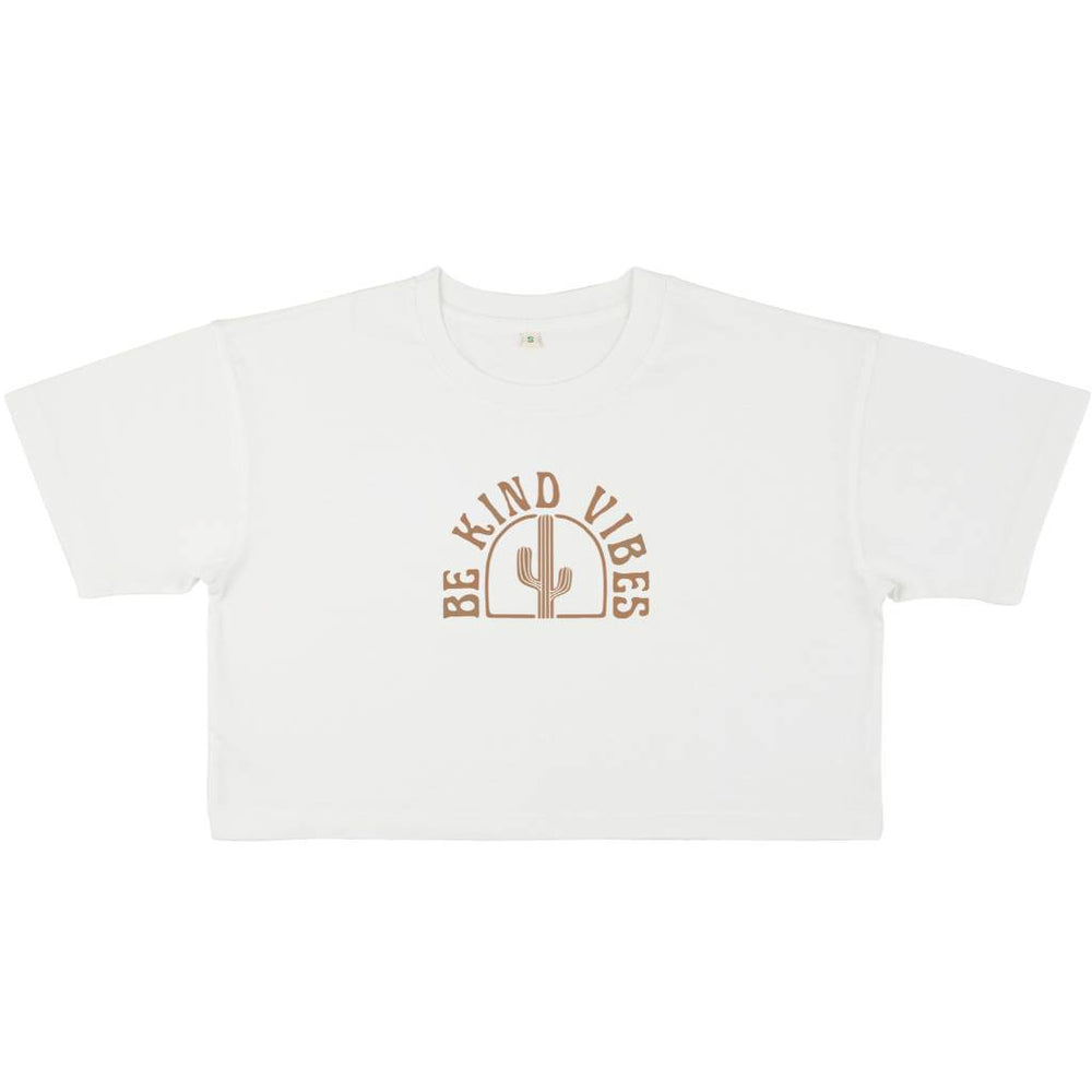 
                  
                    Image features the front of the Be Kind Vibes Desert Waves crop top on in stone wash white on a white background. The logo features a cactus with the text Be Kind Vibes written in a half circle over the top of the cactus.
                  
                