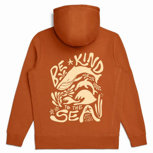 Product image on a white background featuring the back of the Be Kind Vibes 100% organic cotton To The Sea Hoodie in burnt orange.