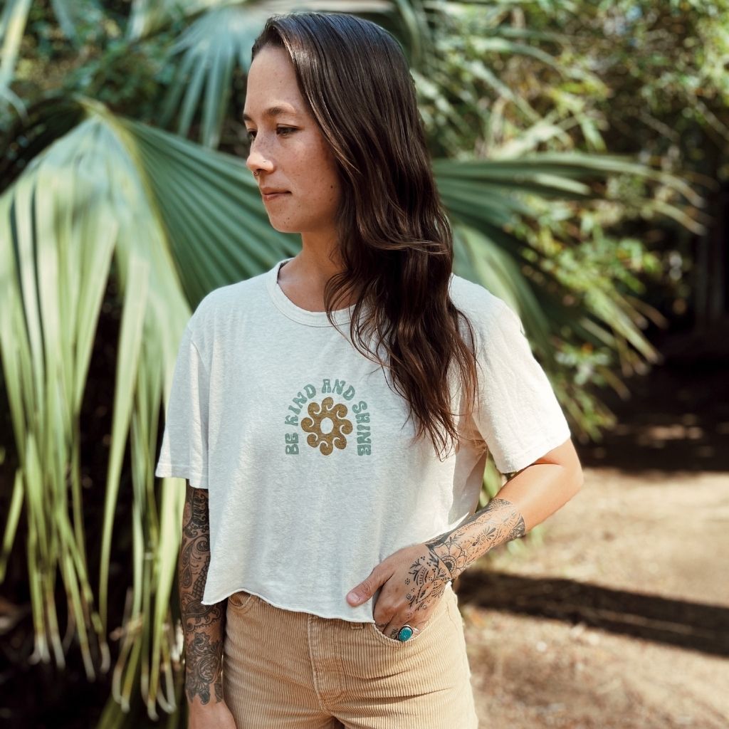 Hero image featuring the front of the Be Kind Vibes Be Kind & Shine crop top in natural